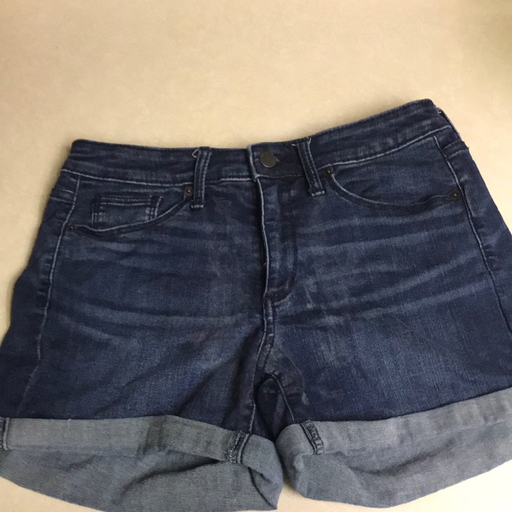 Mid-rise, stretch jean shorts. Size 4.